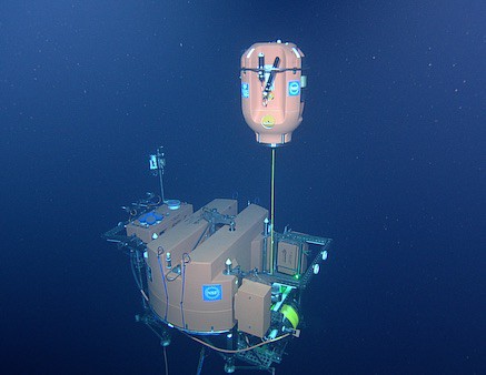 Shallow profiler scientific instrument, underwater, with float uncoiled from its base